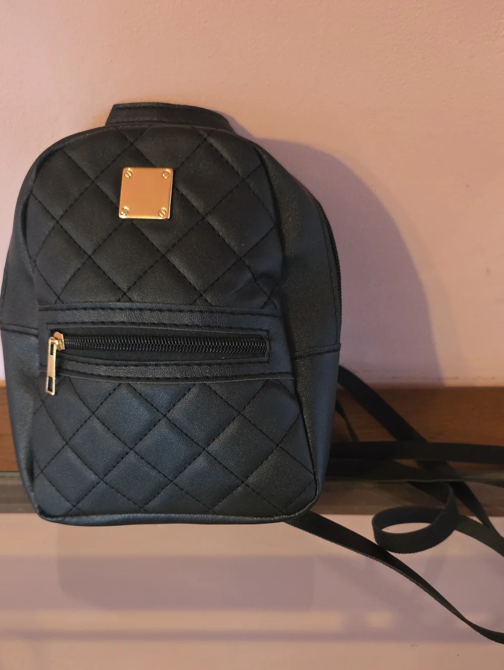 Quilted Black Mini Backpack with Gold Accent